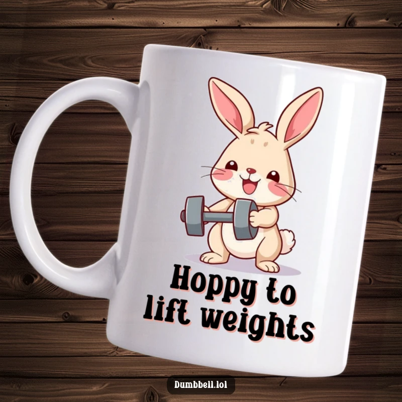 Funny mug showing a happy bunny with a determined expression lifting a tiny dumbbell, celebrating fitness and perseverance.