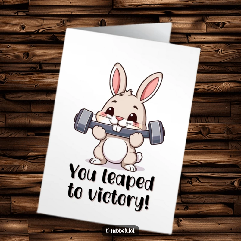 Funny Free Printable Congratulations Card: Pouncing rabbit with dumbbell in mouth, proud expression, celebrating a major win.