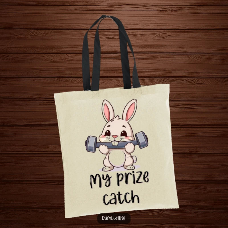 Funny tote bag with a pouncing rabbit holding a dumbbell in its mouth, showcasing determination and humorous fitness.